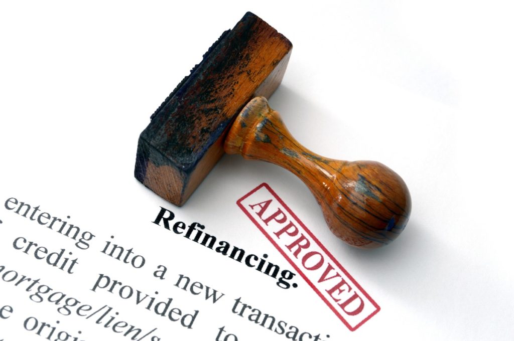 refinancing document with approved stamp